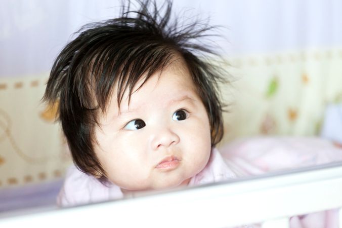 depositphotos 16263007 asian baby girl at home