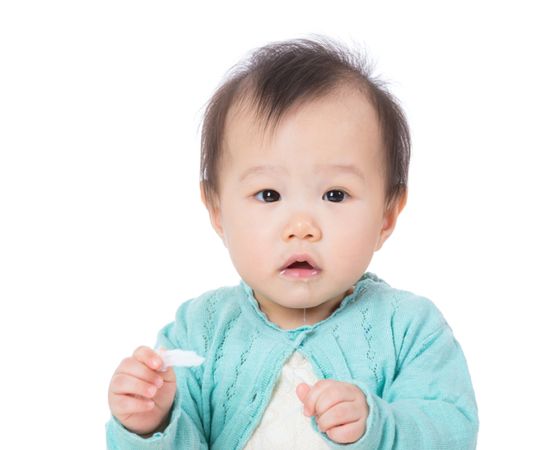 depositphotos 46845255 asia baby girl drooling