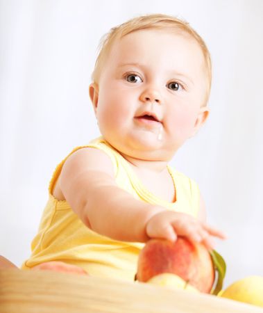 depositphotos 42161707 cute baby with fruits